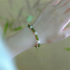 Bambus Segen Armband aus grüner Jade und Perlen