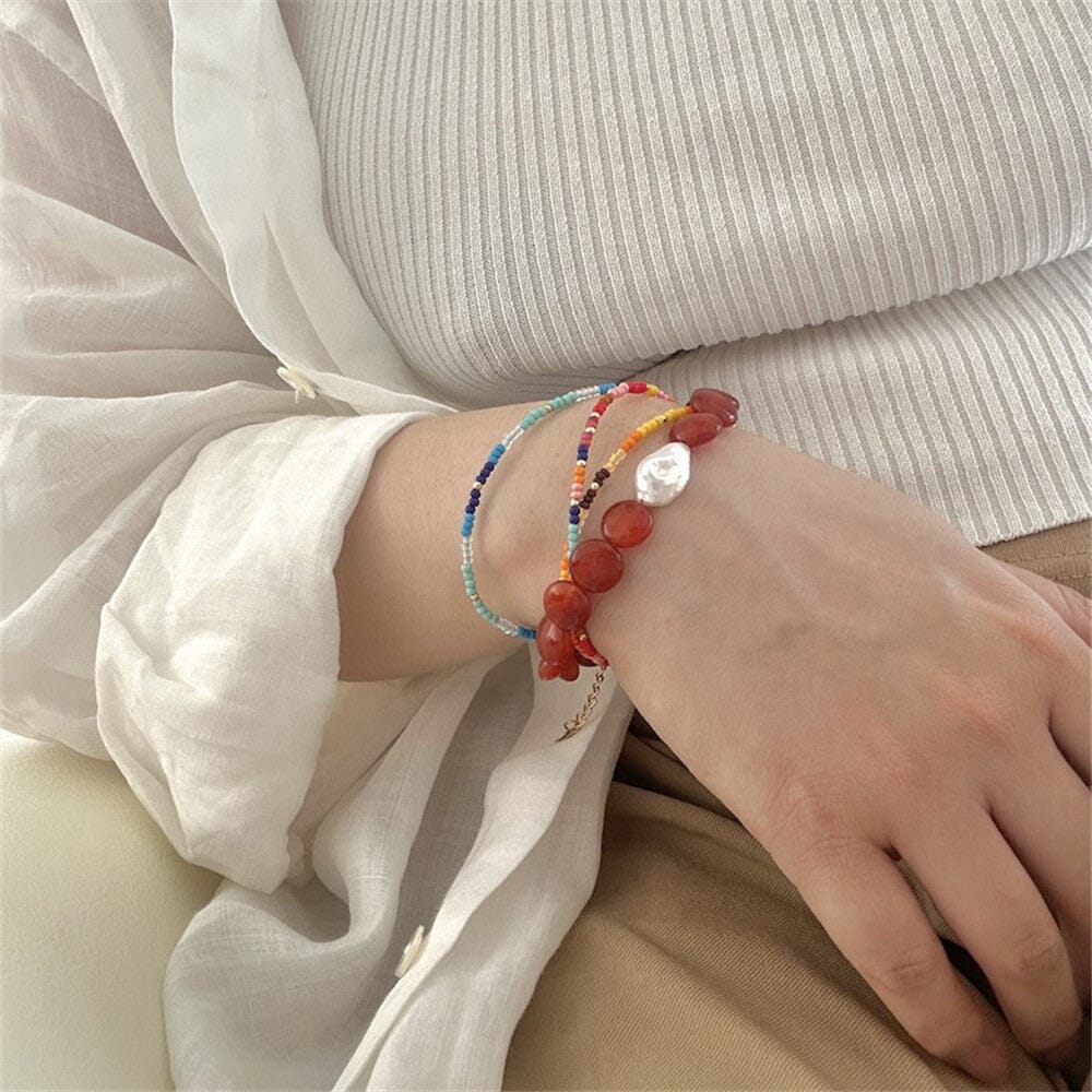 Strahlende Balance Armband aus rotem Achat und Perle