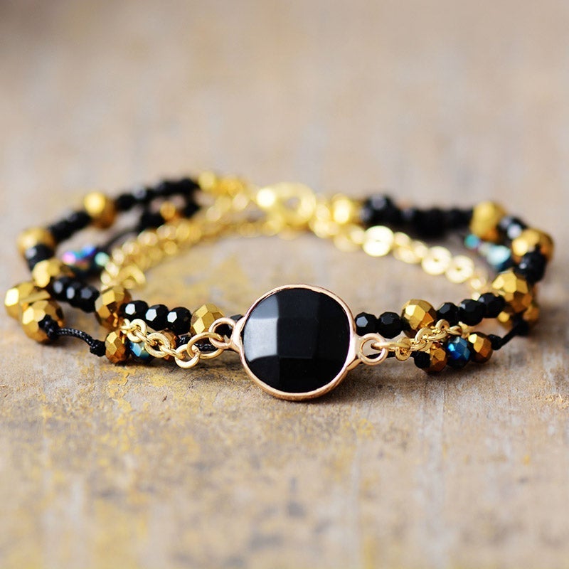 Positive Aura Schwarzer Onyx Vergoldete Perlen Armband
